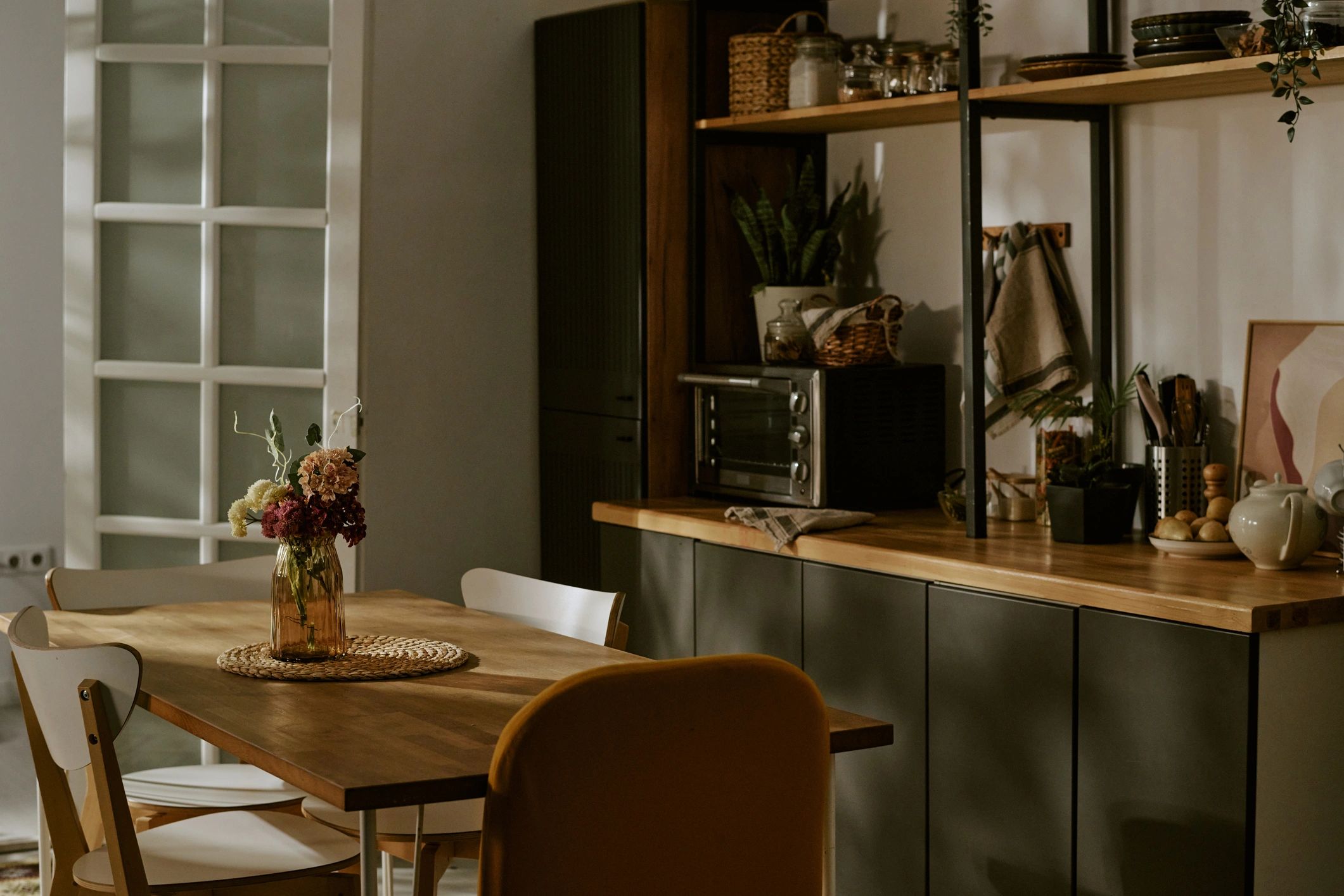 Clean kitchen and dining area with organized surfaces